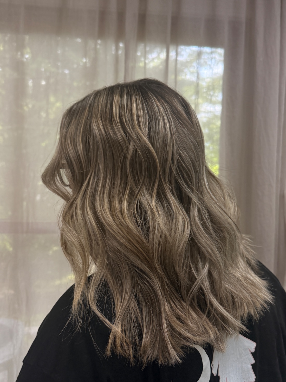 Bronde waves blended so the grow-out stays soft.